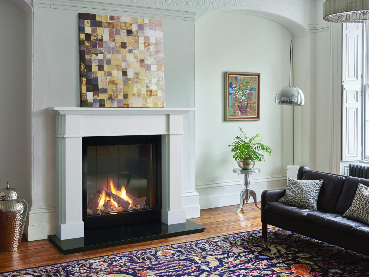 Wood burner in fireplace | heat design company