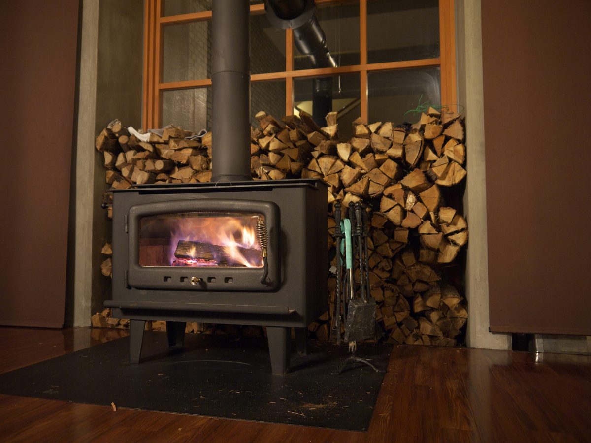 Wood Burner with fire wood  | heat design company